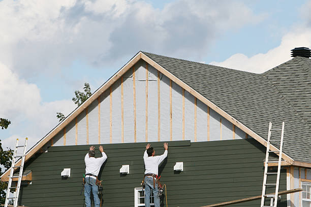 Professional Storm Damage Siding Repair technician working in Newton Falls, OH